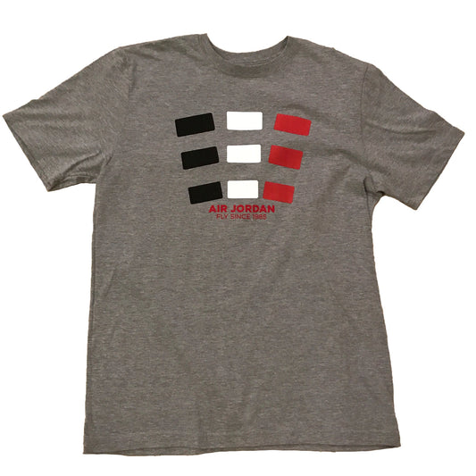 A gray Air Jordan brand t-shirt with the brand's logo in black and red on the front.